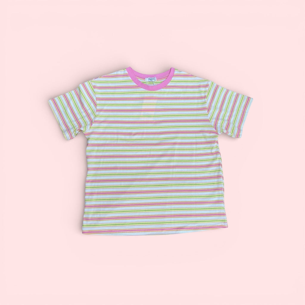 The Marley Edit pink, lemon, and cream striped cotton t-shirt with a pink neckline. Relaxed, boxy fit.